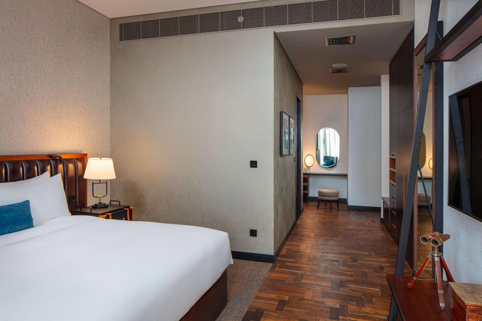 Doubletree By Hilton Dubai M Square Hotel & Residences Εξωτερικό φωτογραφία A room at the hotel