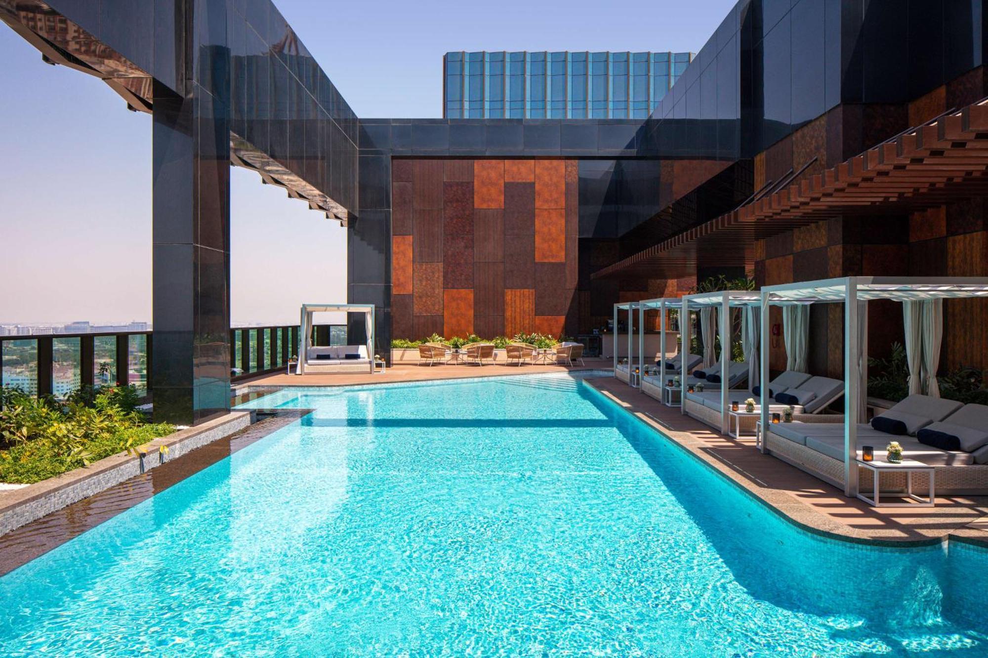 Doubletree By Hilton Dubai M Square Hotel & Residences Εξωτερικό φωτογραφία The pool at the 101 Sky Lounge